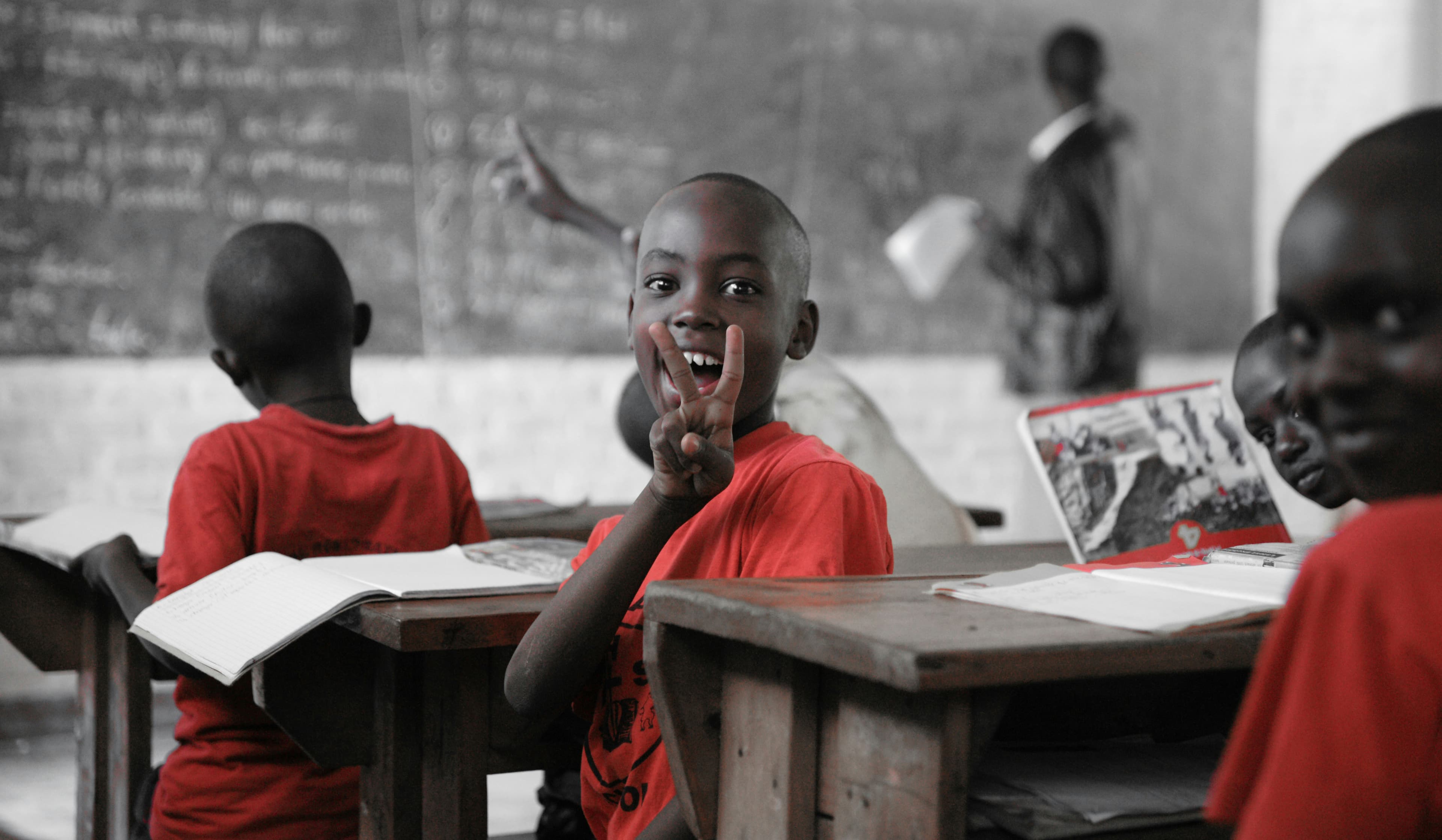 Children receiving educational materials